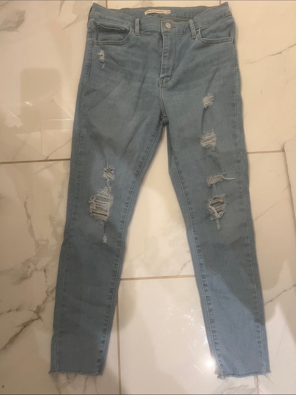 Levi's Light Wash Ripped Skinny Jeans